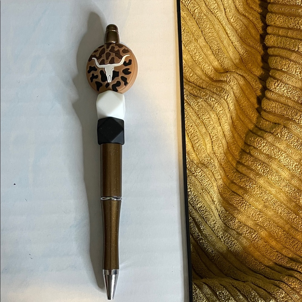 Brown and Black Decorative Pen